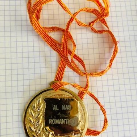 troc de  Médaille d'or du plus romantique en espagnol (Al mas Romantico), sur mytroc