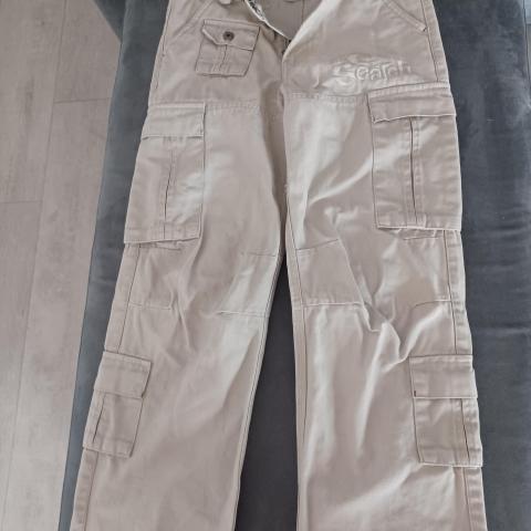 troc de  Pantalon 10/12 ans Ripcurl TBE, sur mytroc