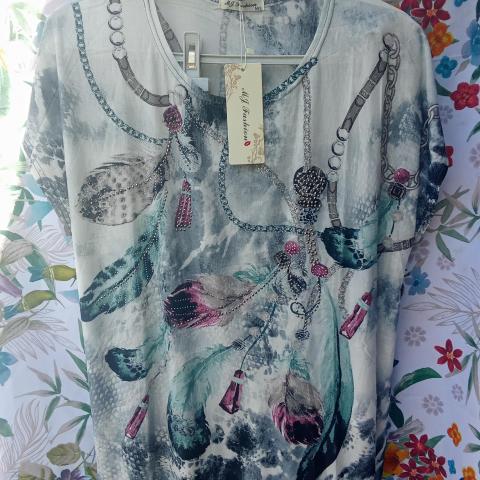 troc de  Tee shirt neuf taille M/L réserver fidjy, sur mytroc