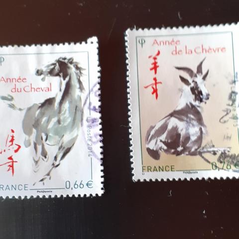 troc de  2 timbres horoscope chinois, sur mytroc