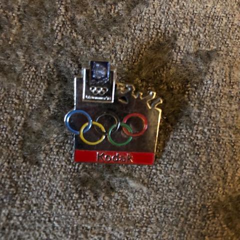 troc de  (réservé) Pin's Kodak sponsor Jeux Olympiques, sur mytroc