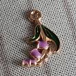 troc de troc reserver valvi. un  pendentif image 0