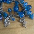 troc de troc bracelet à perles bleues et breloques image 1