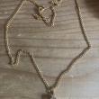 troc de troc chaîne dorée avec pendentif imitation diamant image 0
