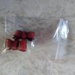 troc de troc boucle d oreille noeud rouge neuf image 0