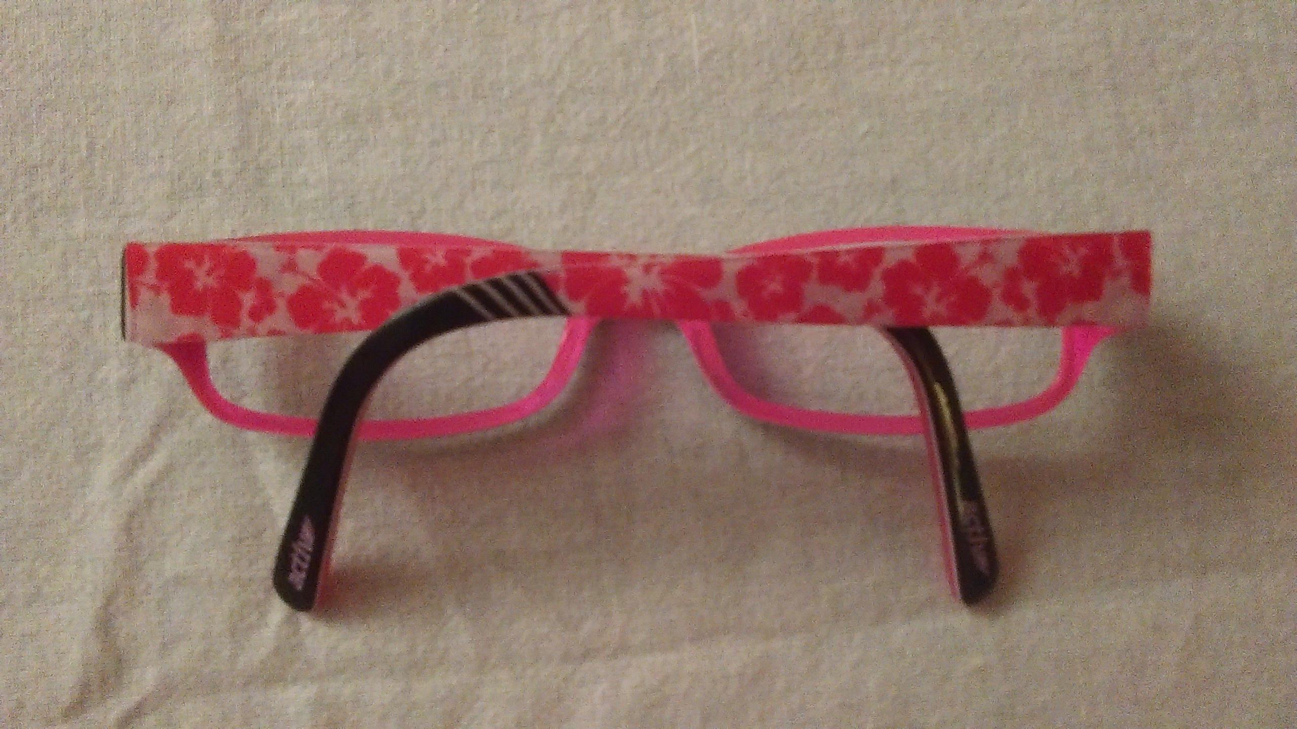 troc de troc monture de lunettes rose et noire. image 1