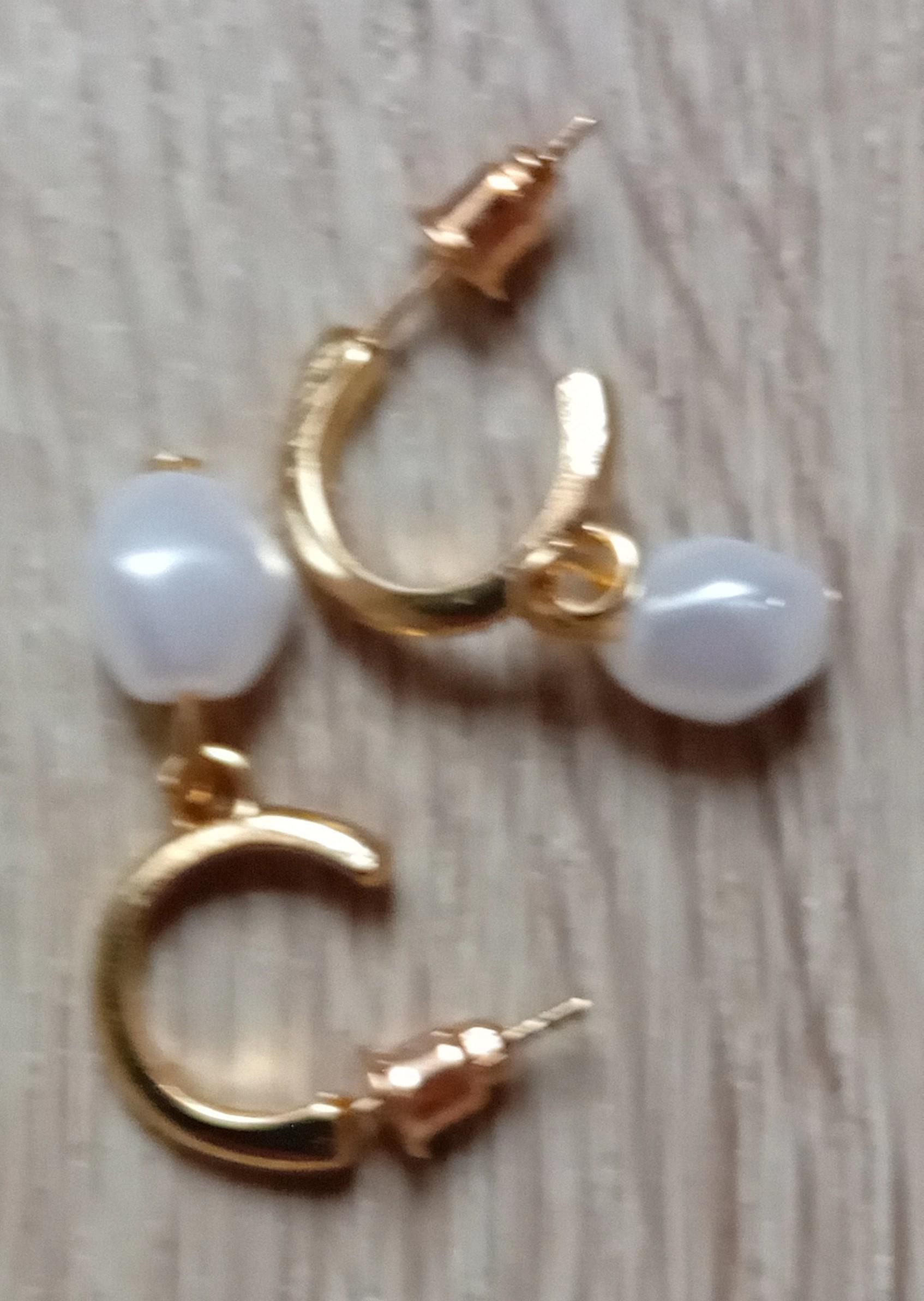 troc de troc boucle d'oreille femme image 1