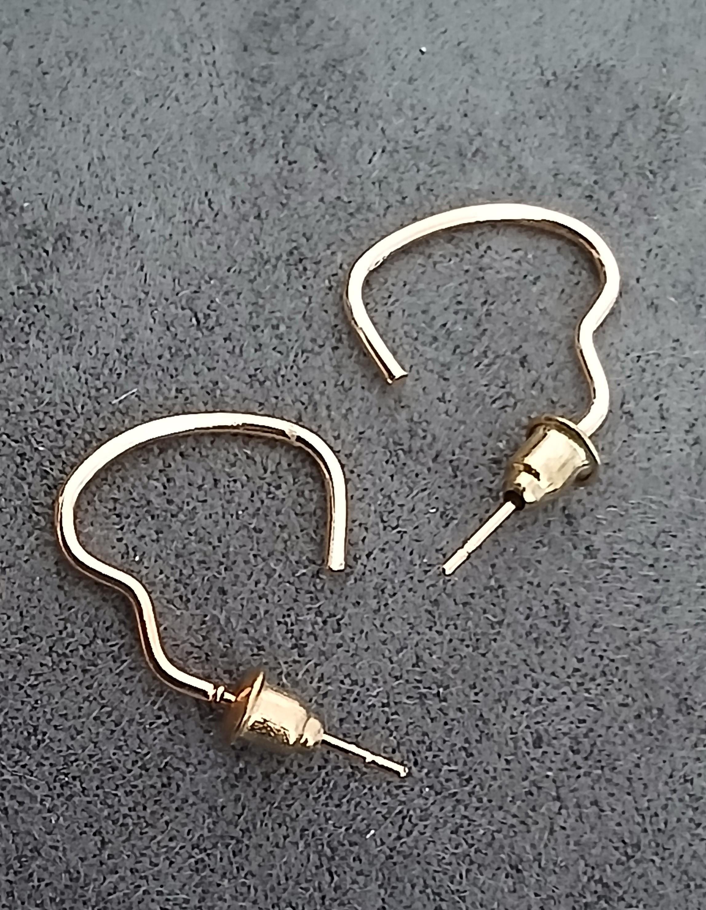 troc de troc reserver troqueuse une boucle d oreille image 1