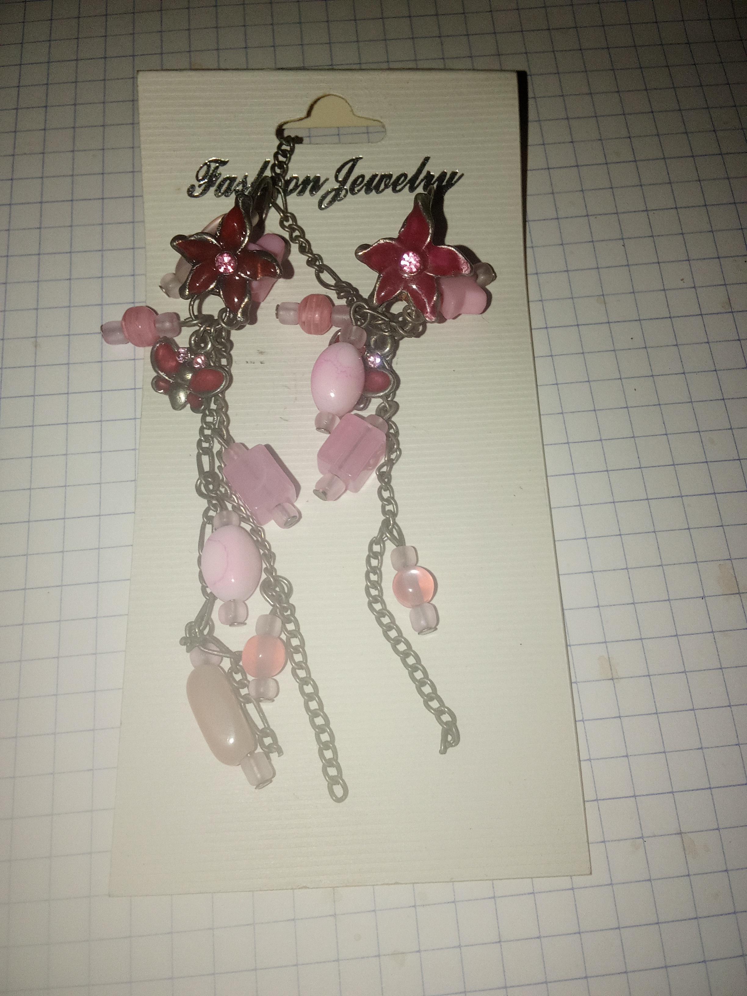 troc de troc boucles d'oreilles neuves image 0