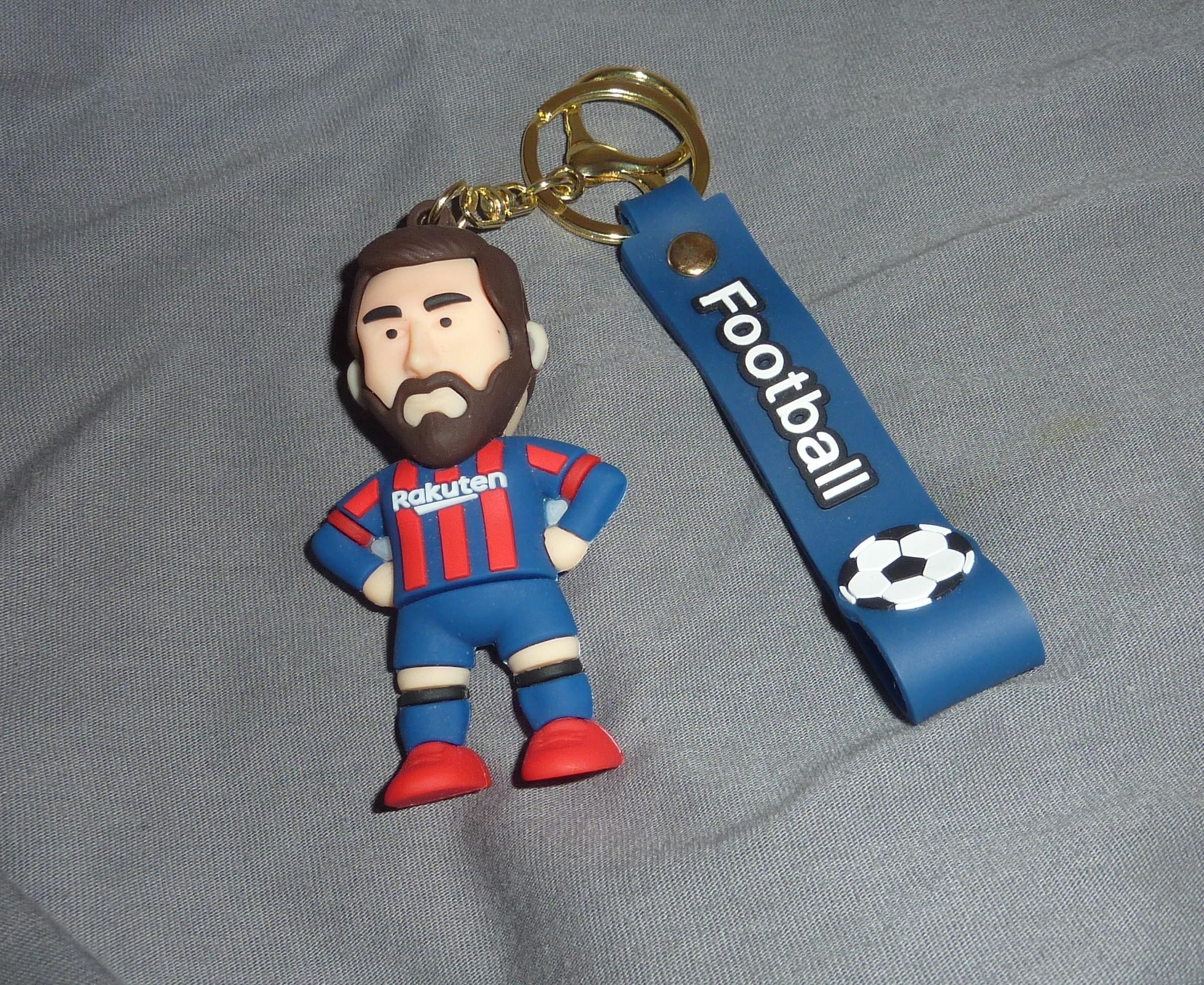 troc de troc porte clé messi en silicone image 0