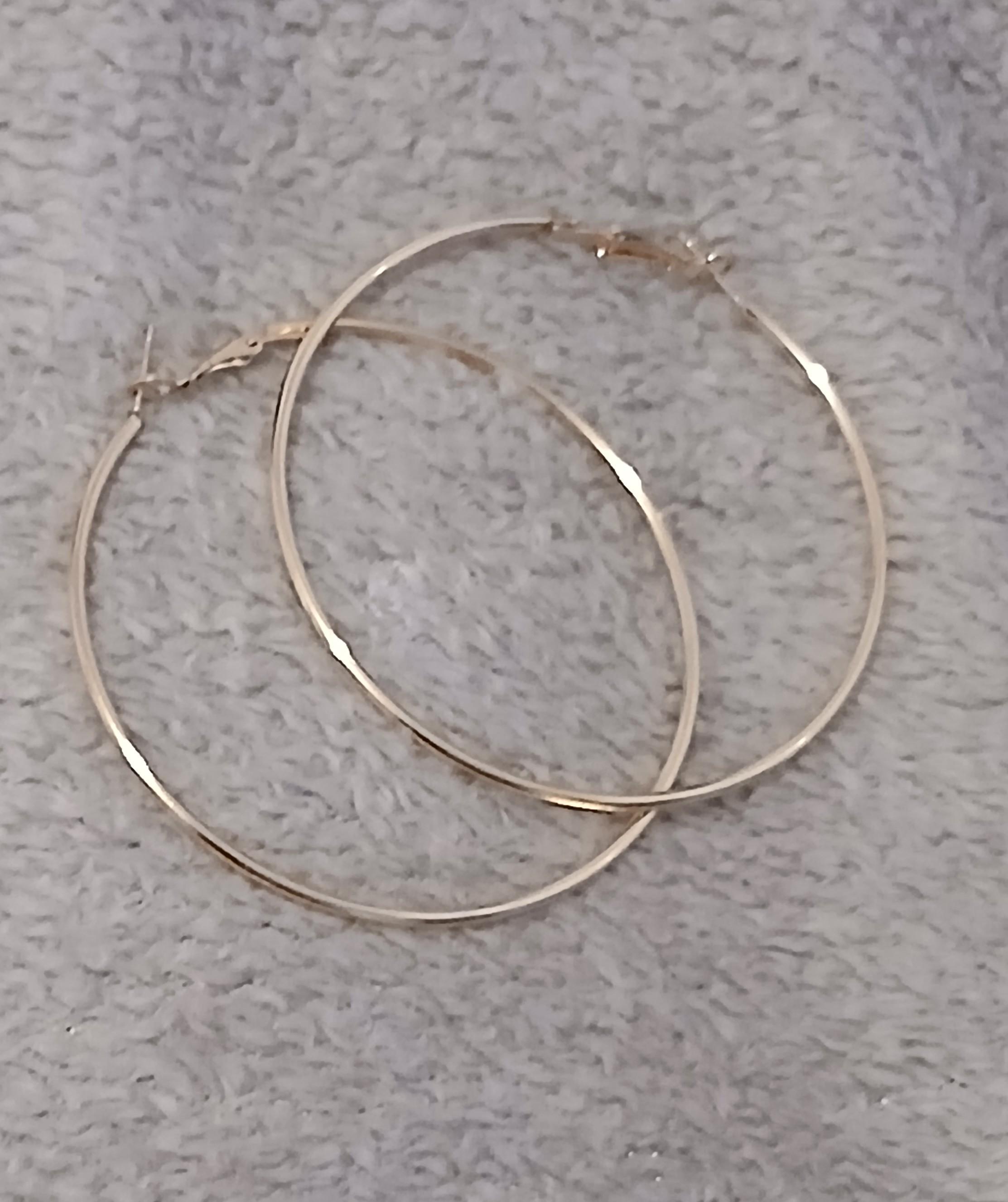 troc de troc une paire de boucle d oreille image 1