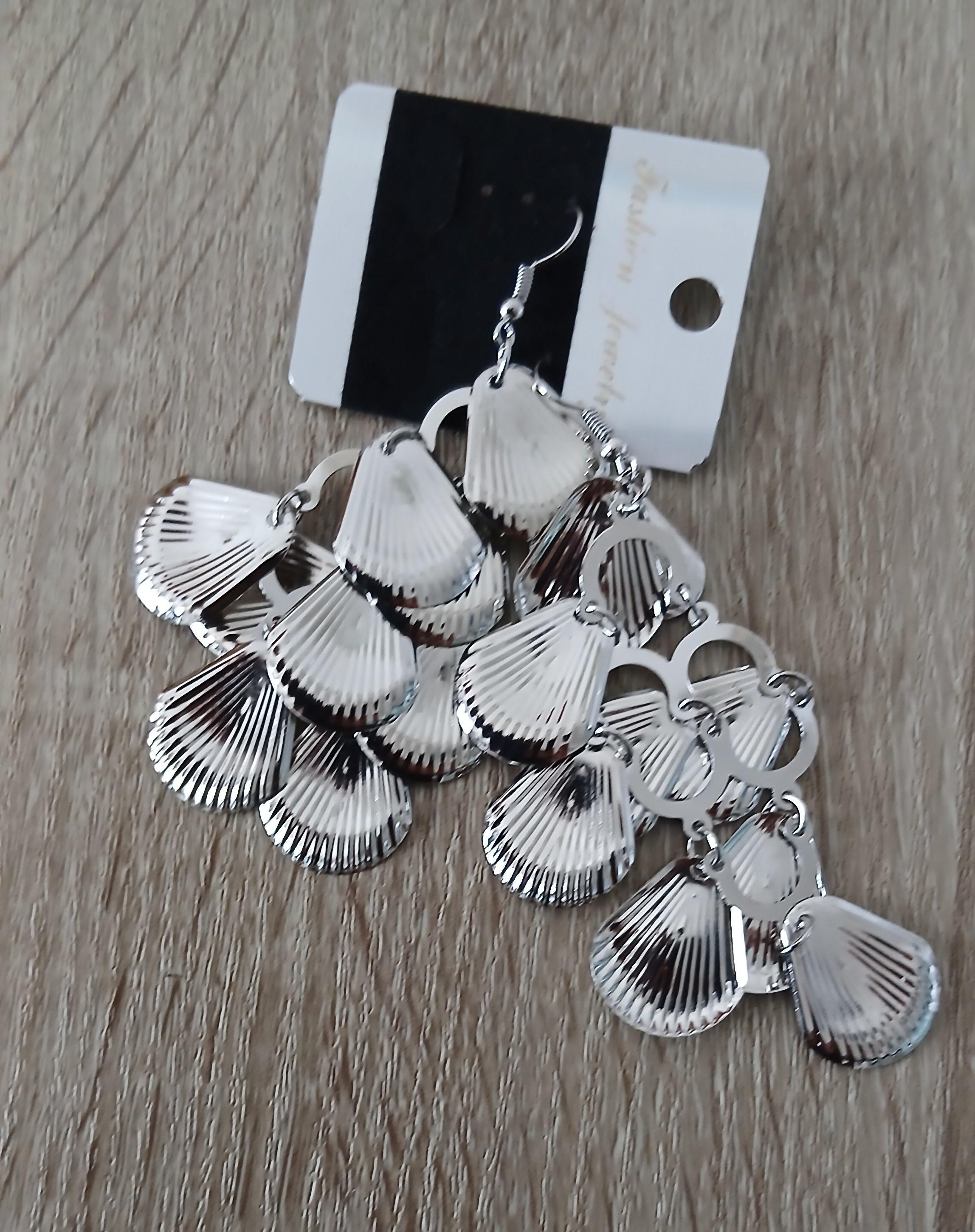 troc de troc une paire de boucle d oreille image 0