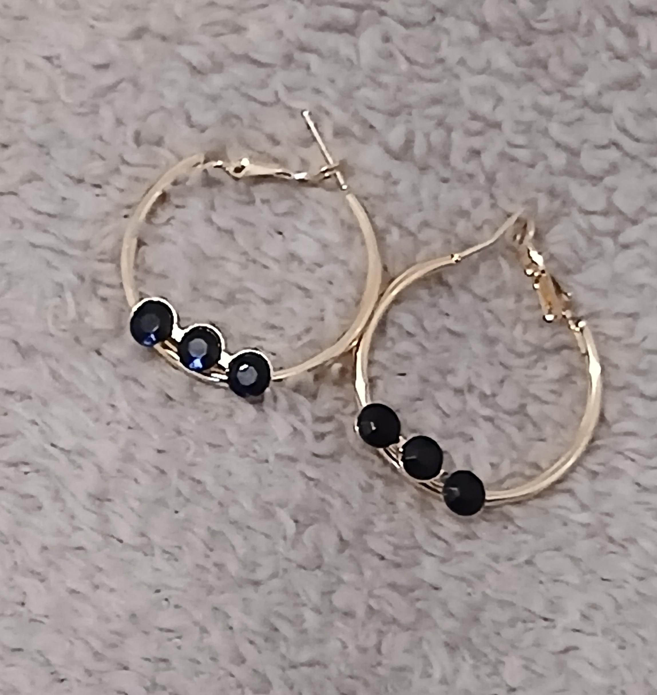 troc de troc une paire de boucle d oreille image 0