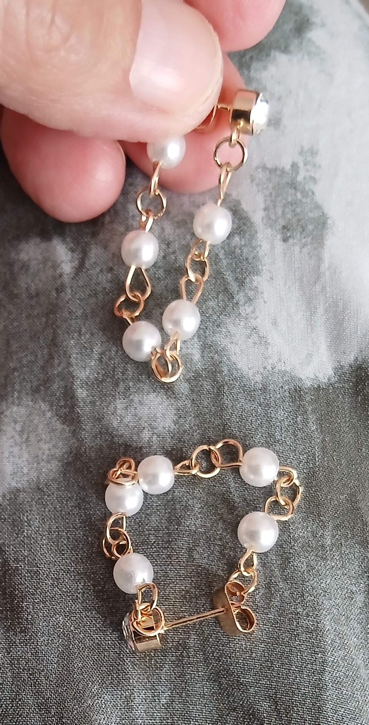 troc de troc une paire de boucle d oreille image 1