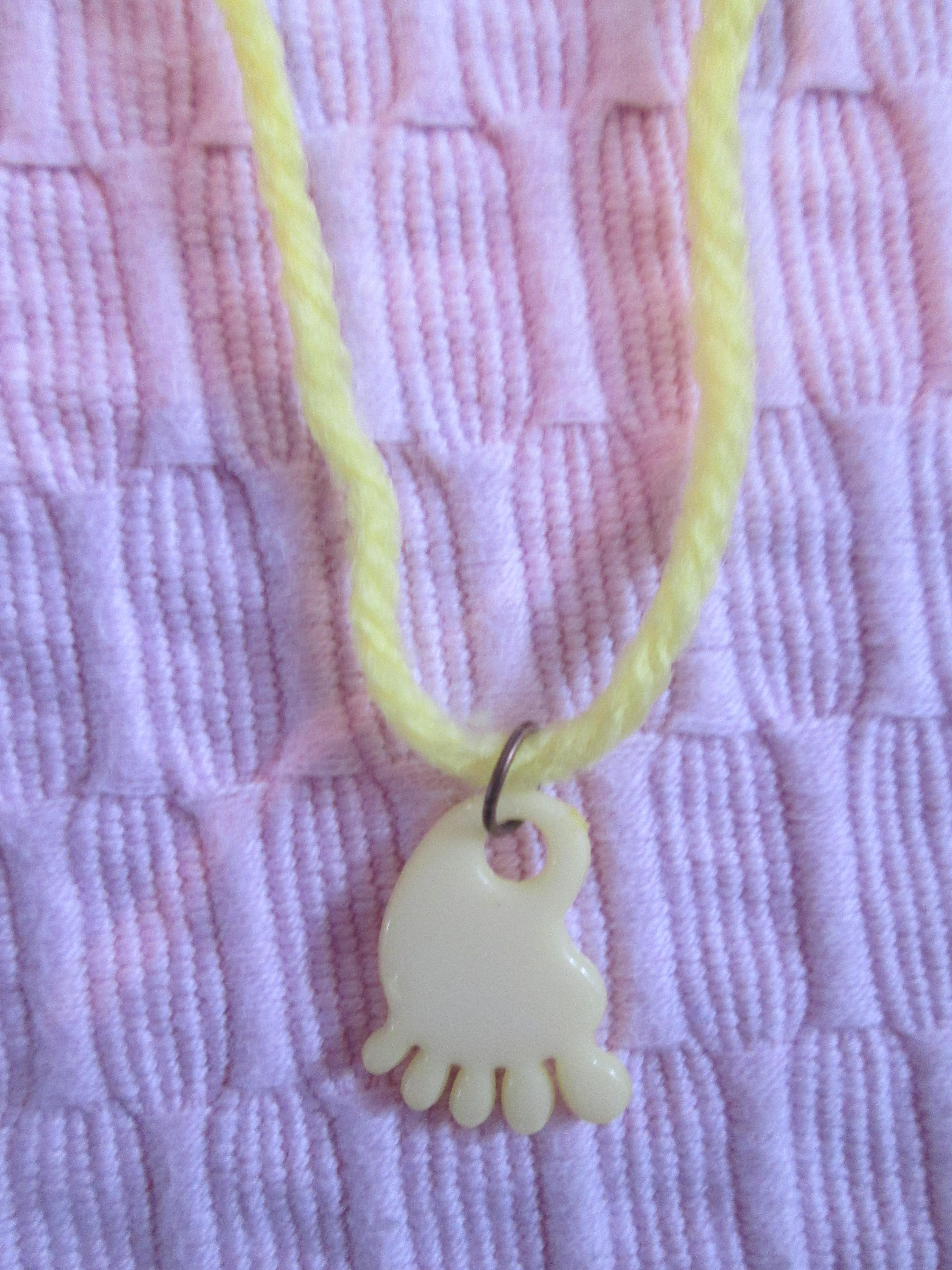 troc de troc collier pied jaune. image 0