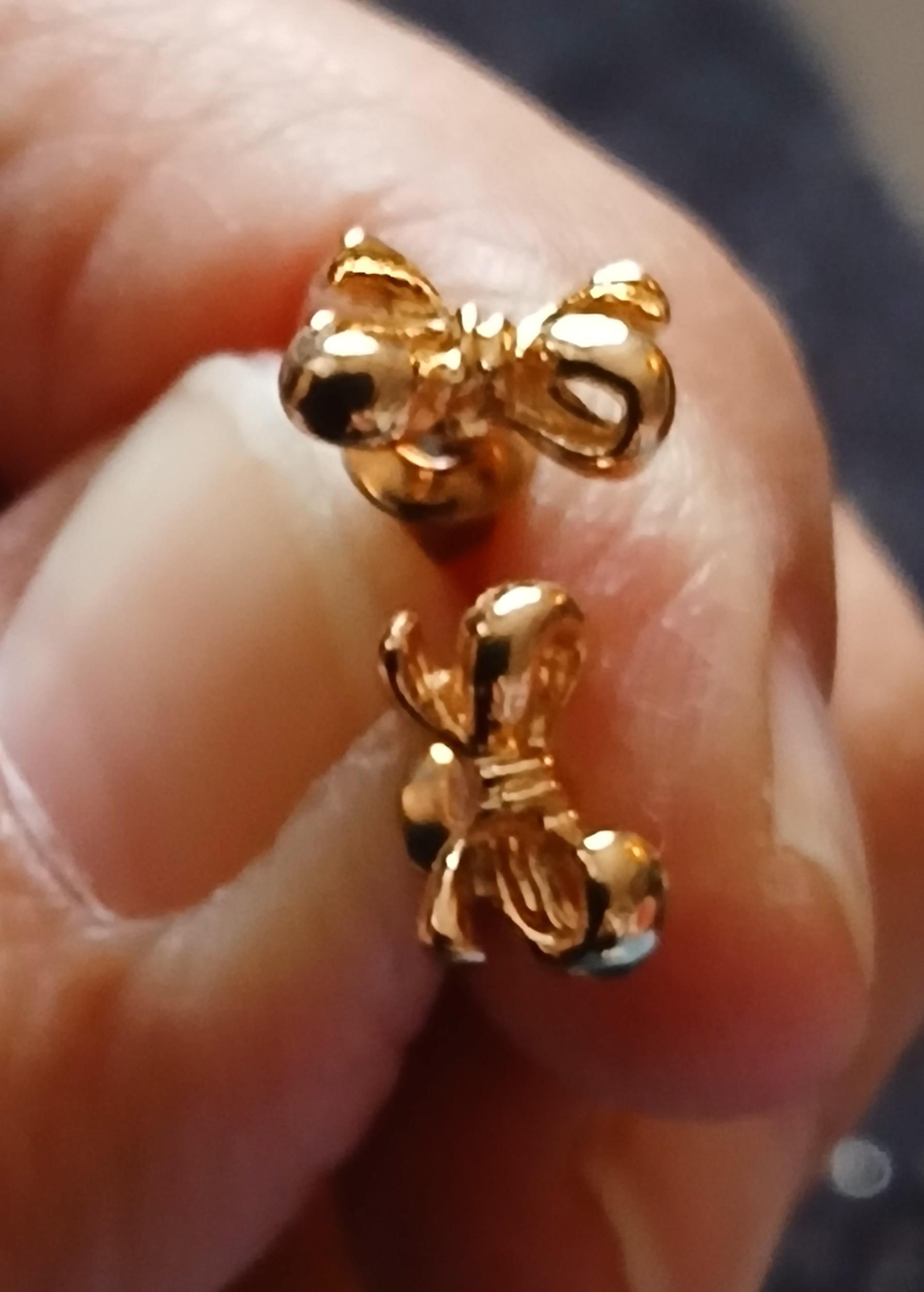 troc de troc une boucle d oreille image 1