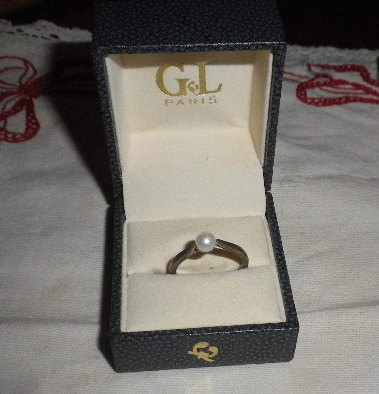 troc de troc bague argent et perle à refixer image 0