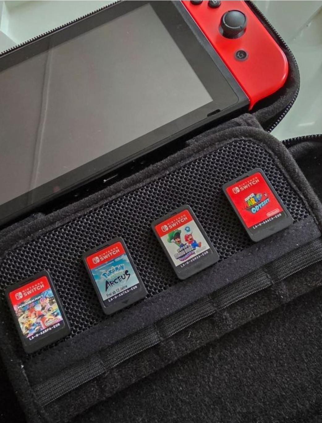 troc de troc nintendo switch bunddle complet + 5jeux image 0