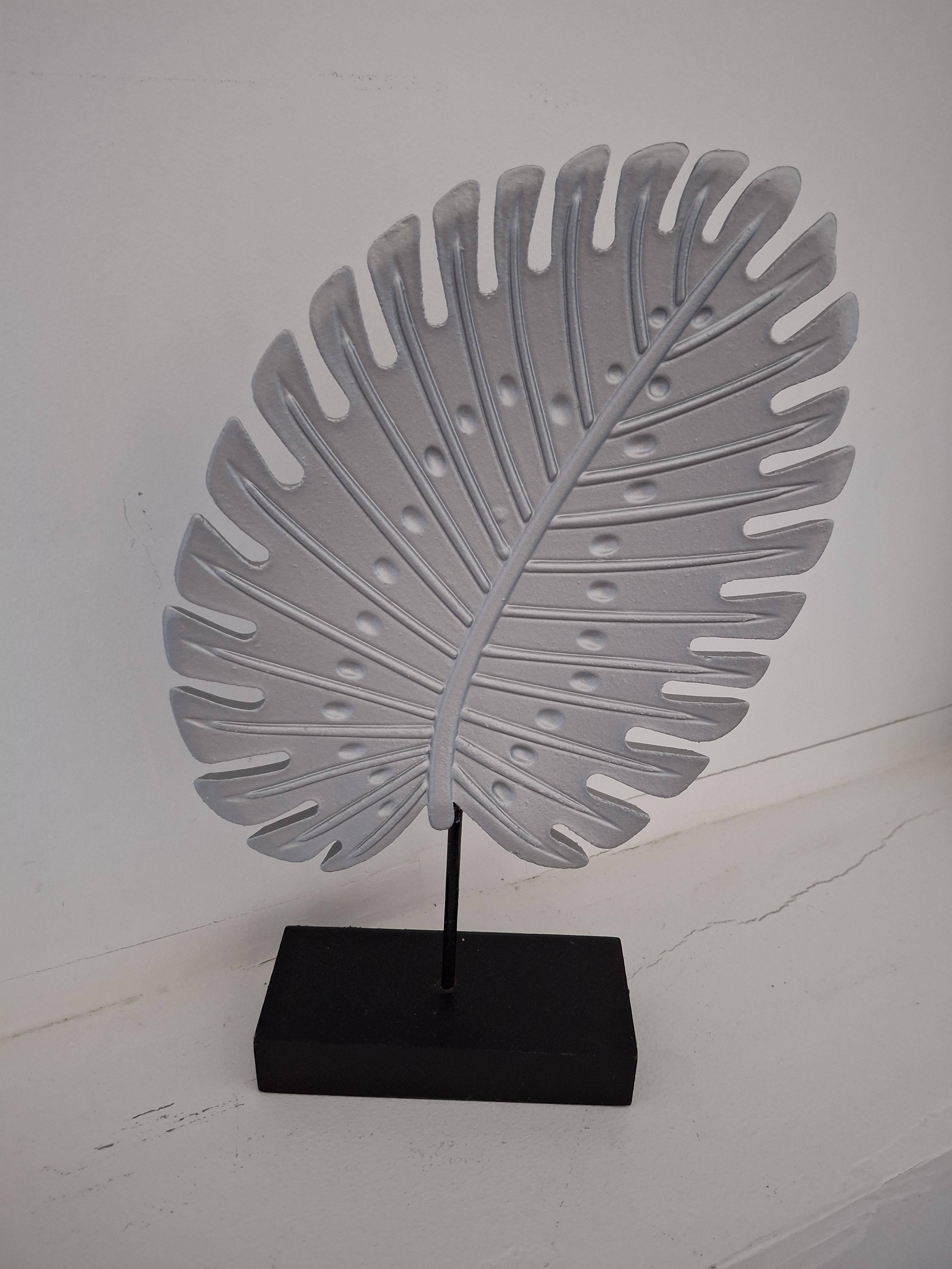troc de troc feuille sur socle image 0