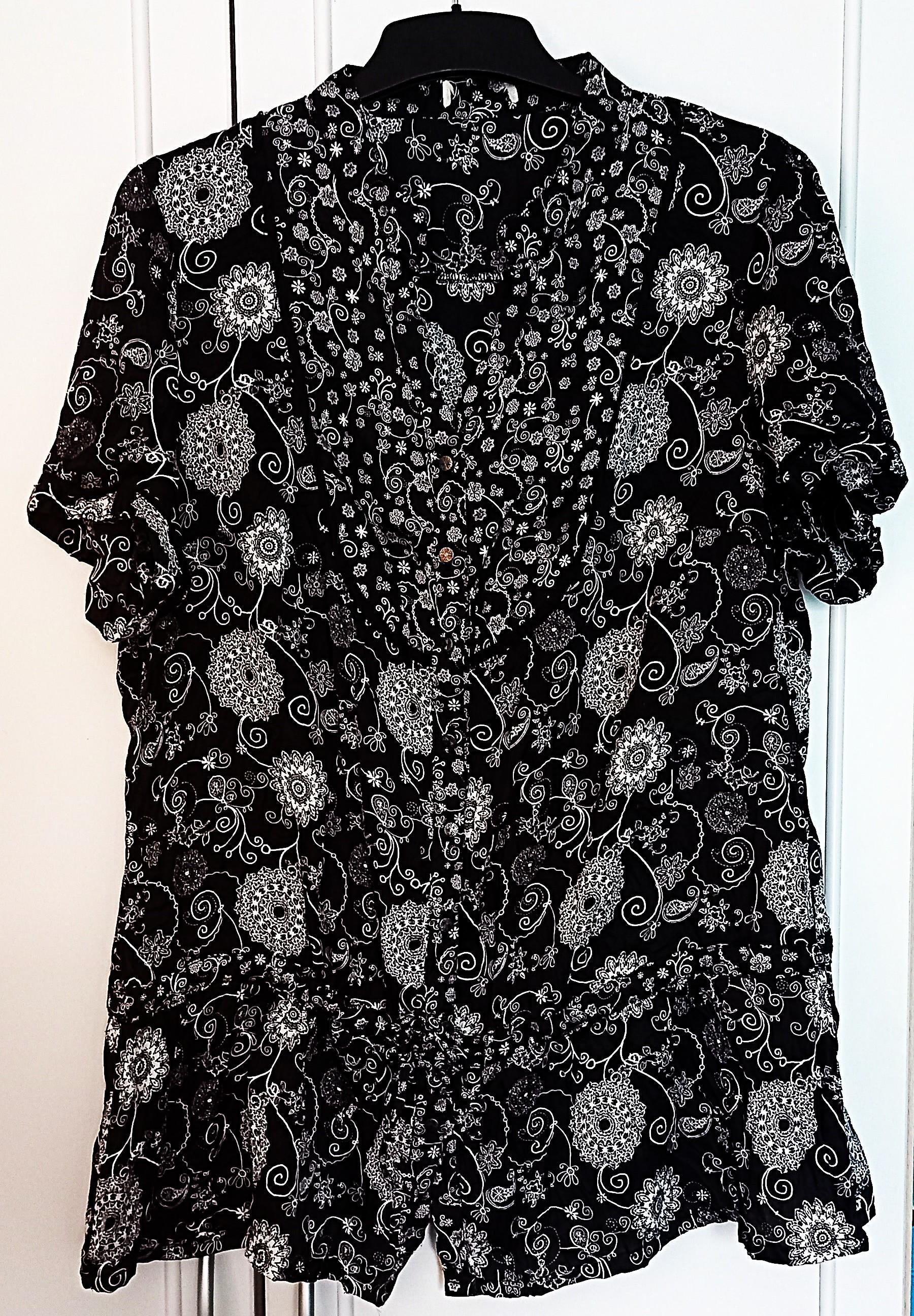 troc de troc chemise noire et blanche. image 0