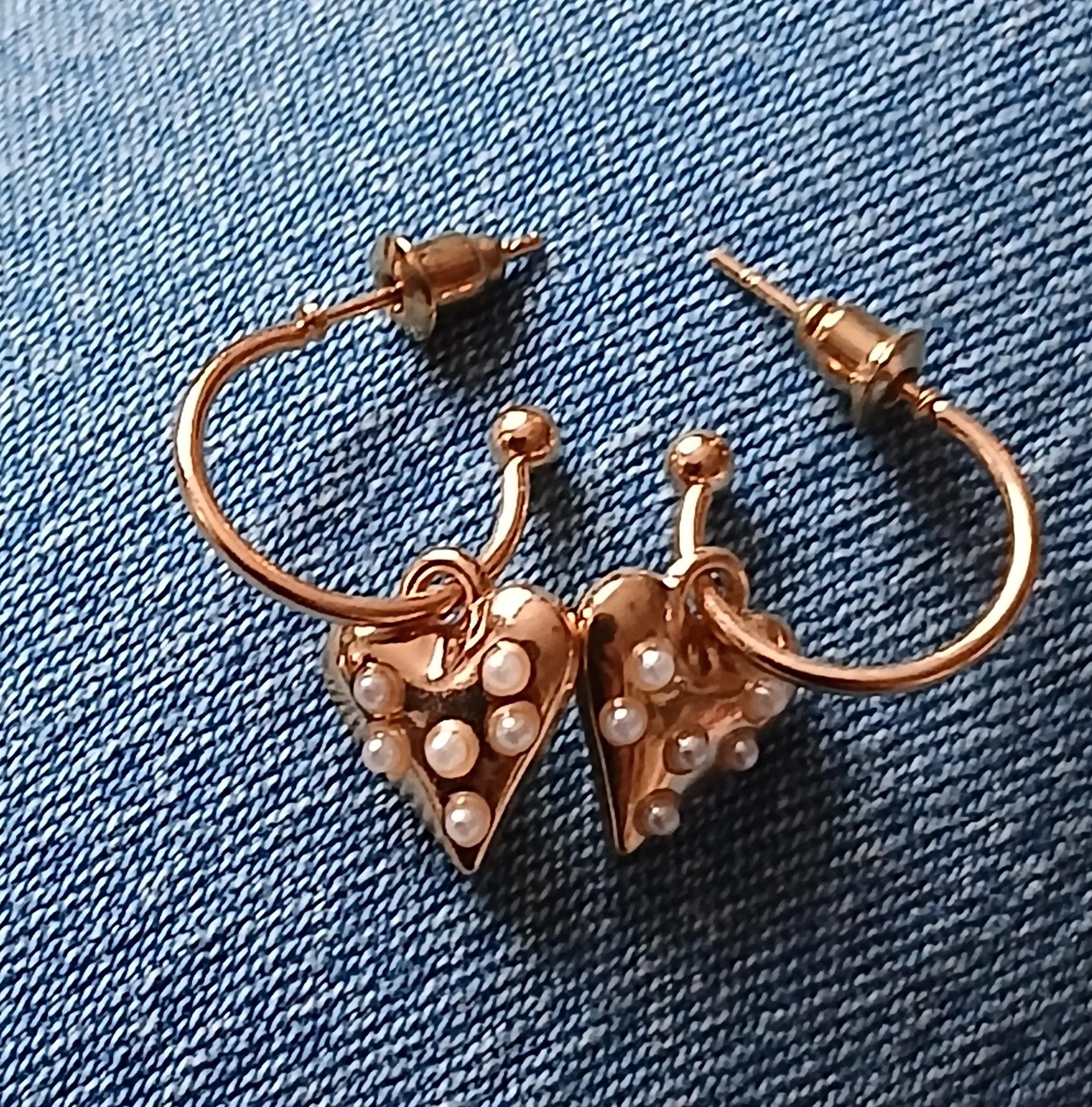 troc de troc une boucle d oreille image 0