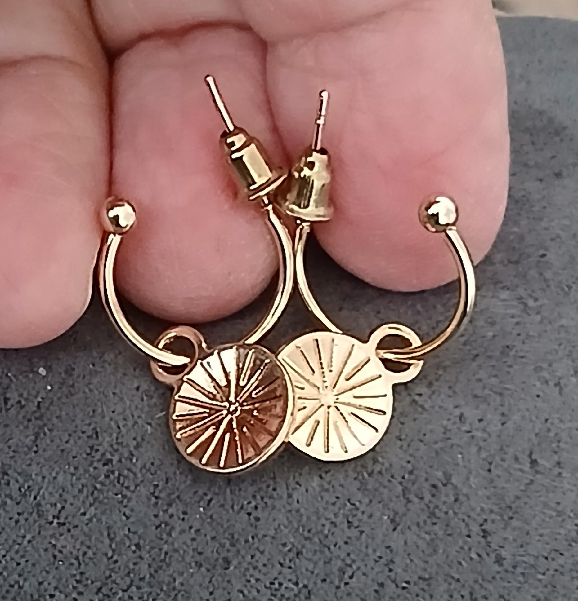 troc de troc reserver troqueuse un boucle d oreille image 1