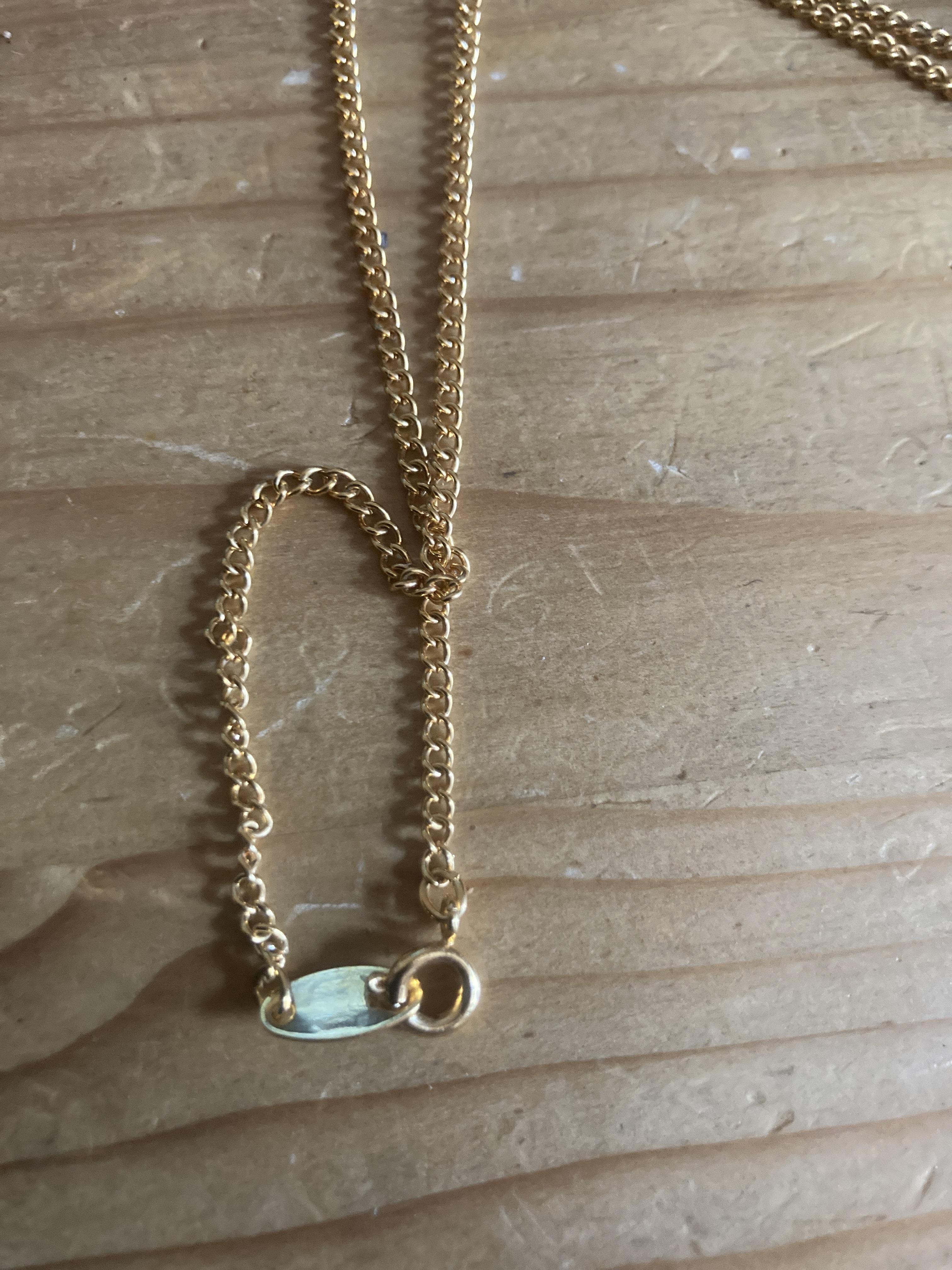 troc de troc chaîne dorée avec pendentif imitation diamant image 2