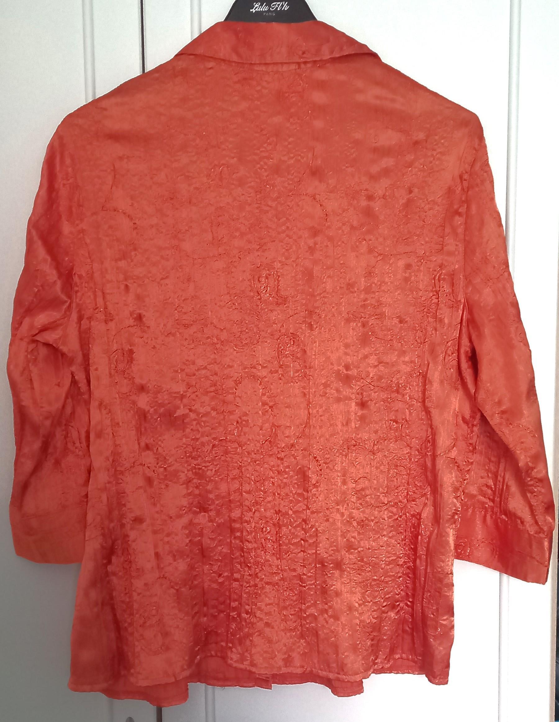 troc de troc chemise orange vive. image 2