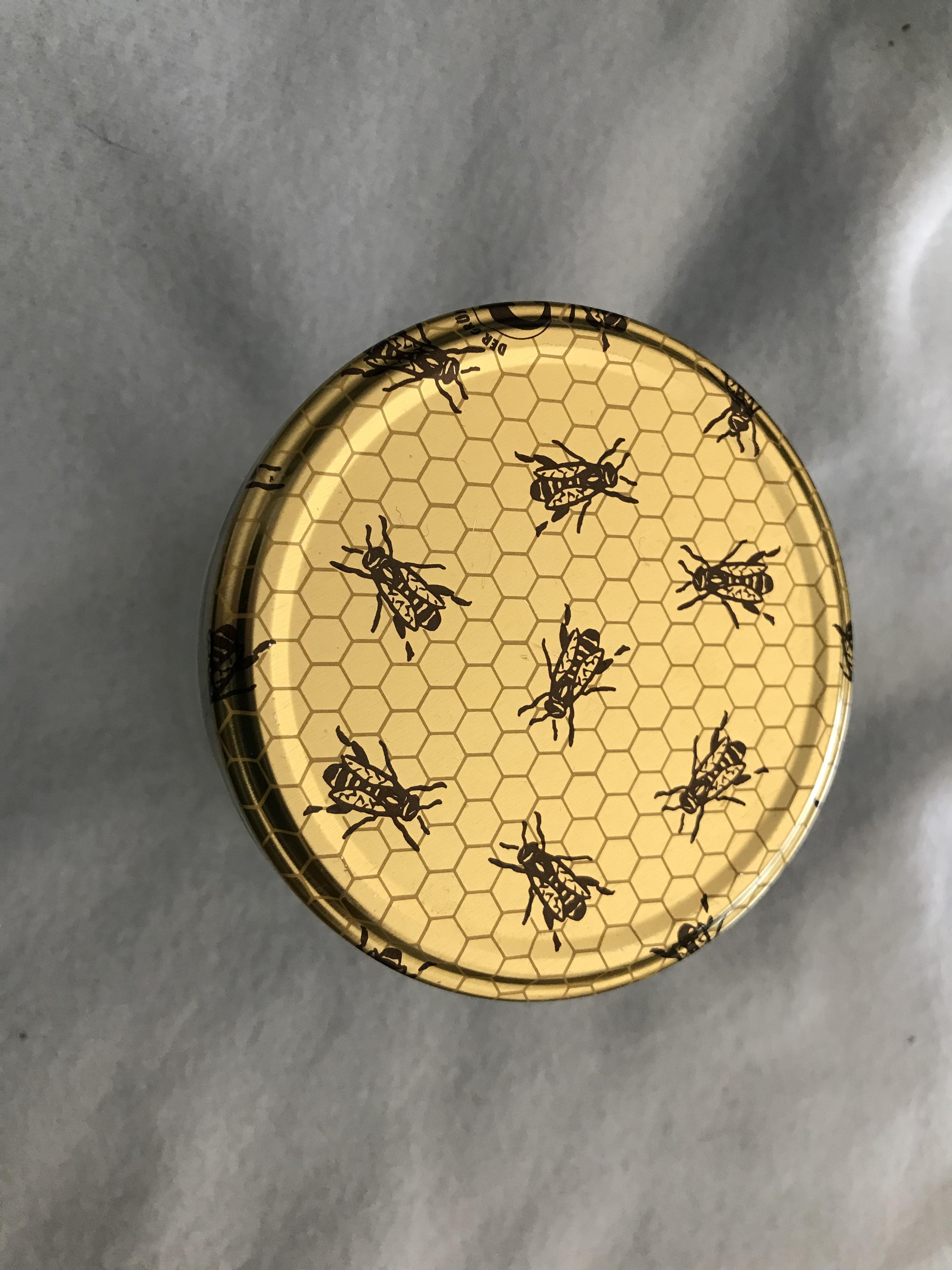 troc de troc couvercle d'abeilles et son pot de miel vide en verre image 0