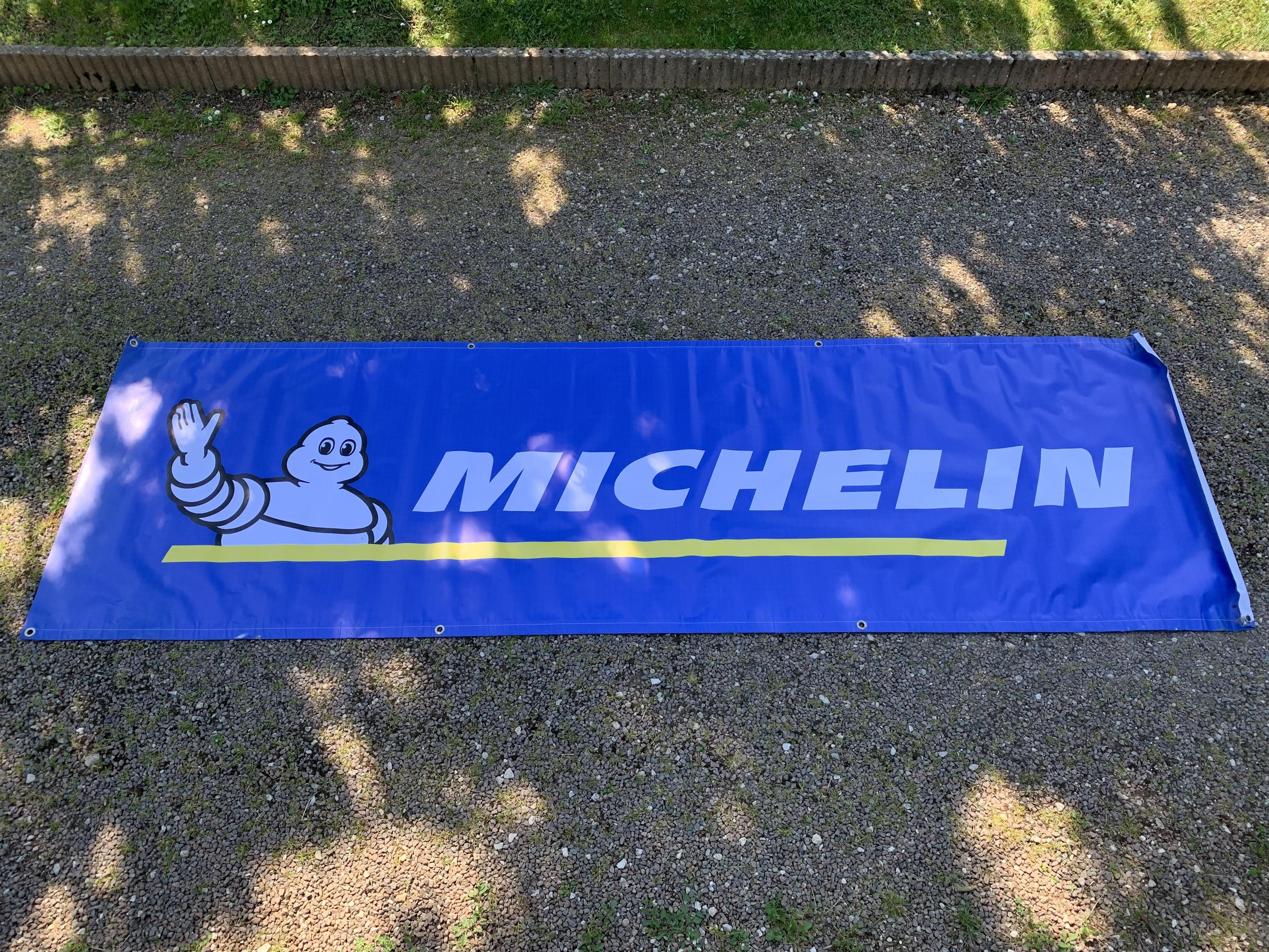 troc de troc bâche publicitaire michelin image 0