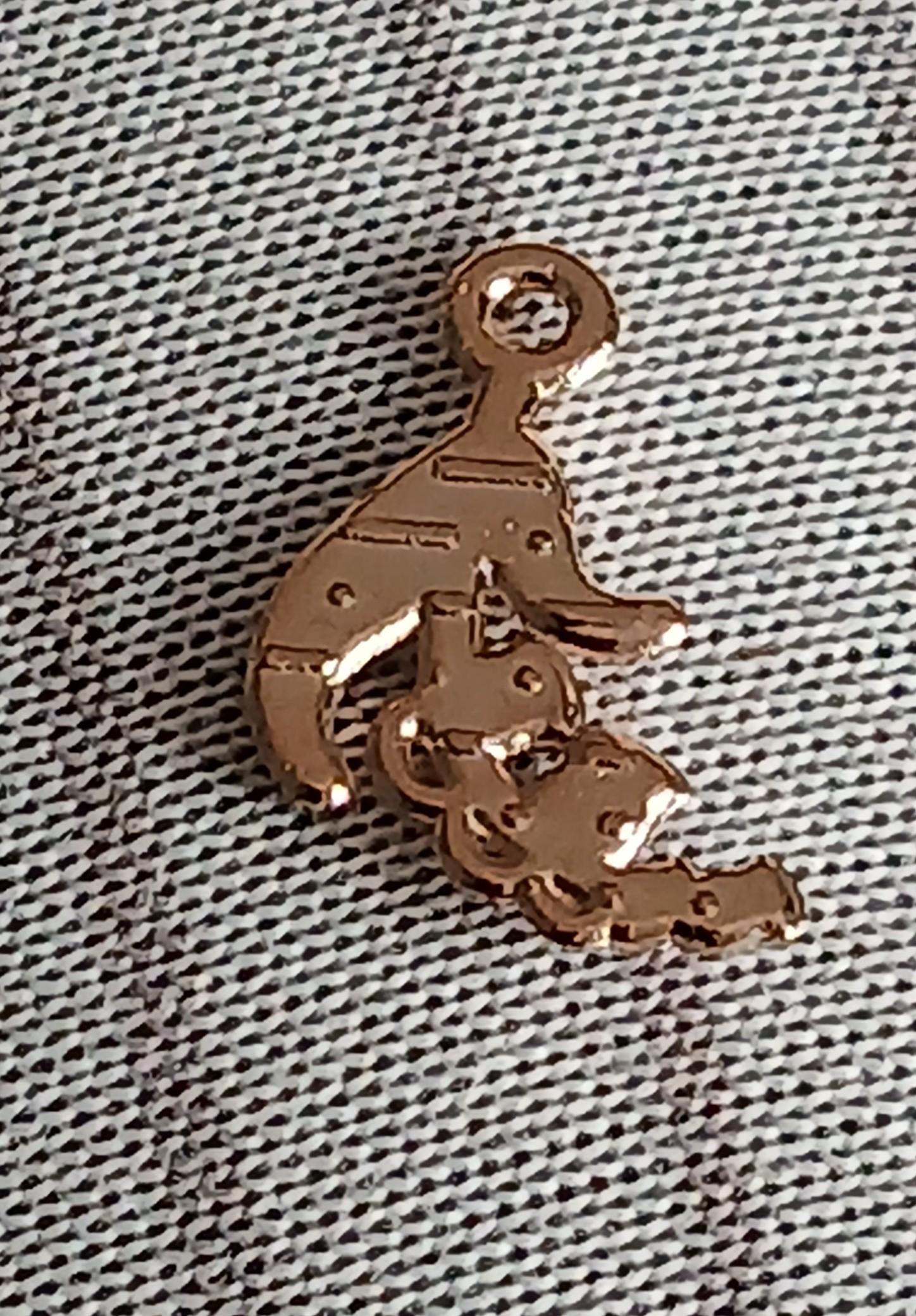 troc de troc reserver valvi. un  pendentif image 1