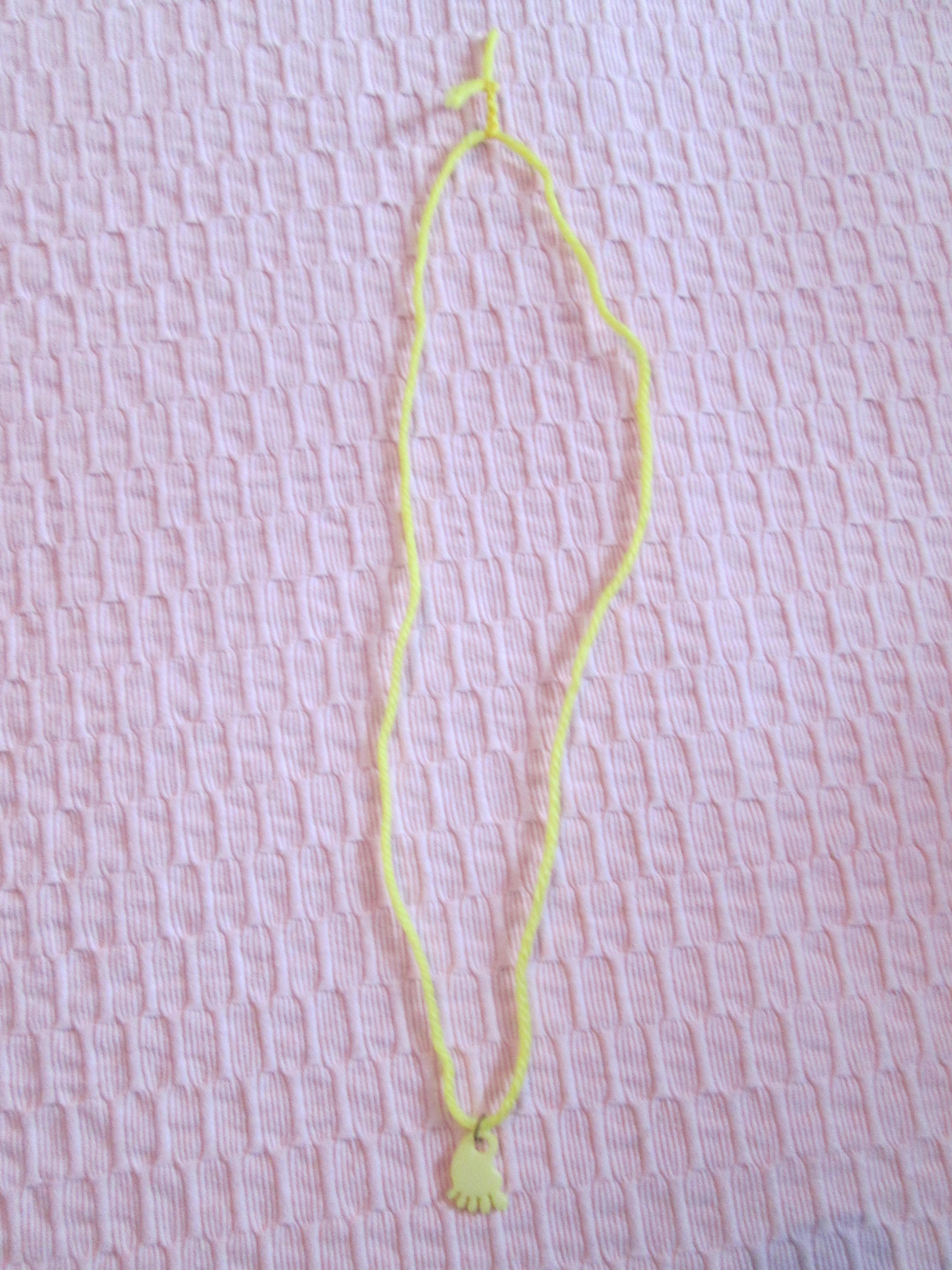 troc de troc collier pied jaune. image 1