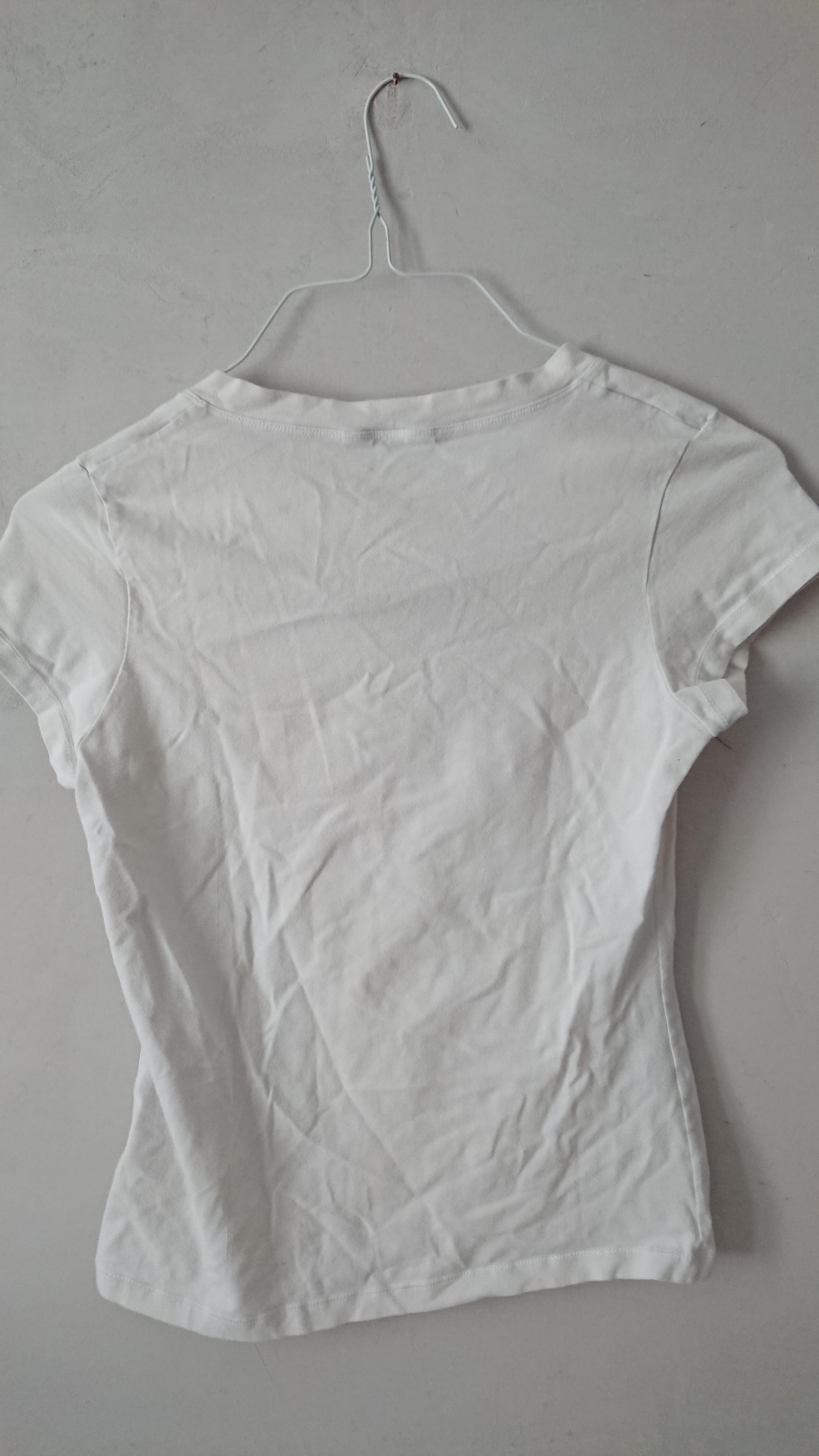 troc de troc tshirt blanc avec fleur taille équivalente 38/40 image 1