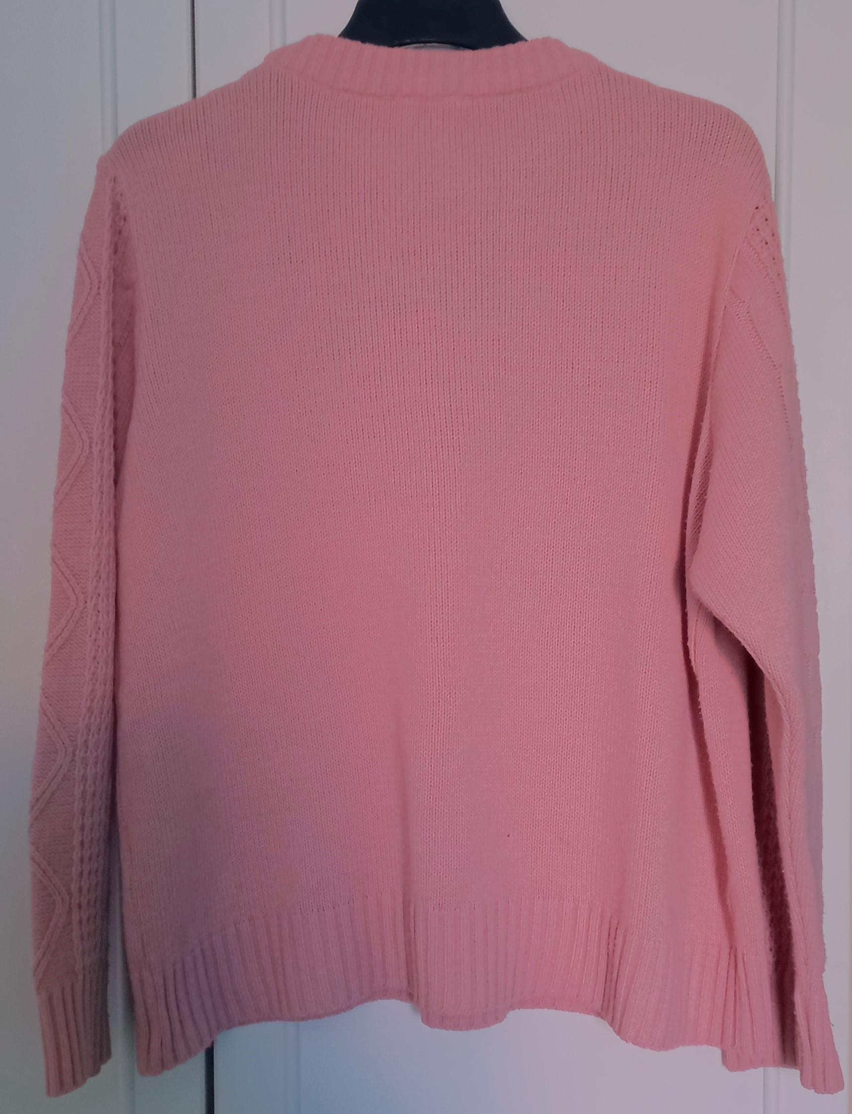 troc de troc pull rose clair. image 2