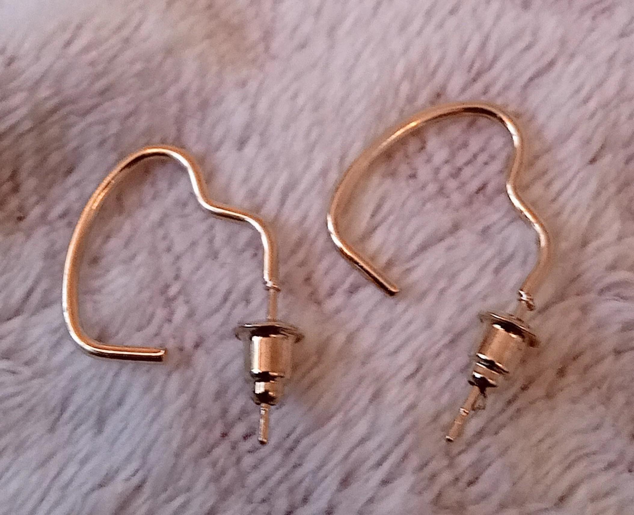 troc de troc boucle d'oreille femme image 0