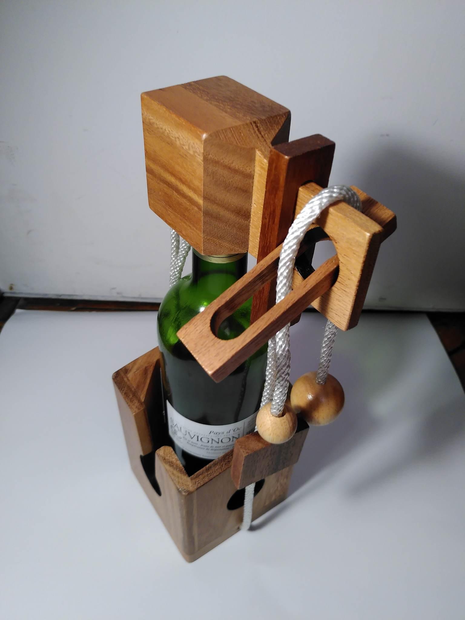 Troc casse-tête bouteille en bois