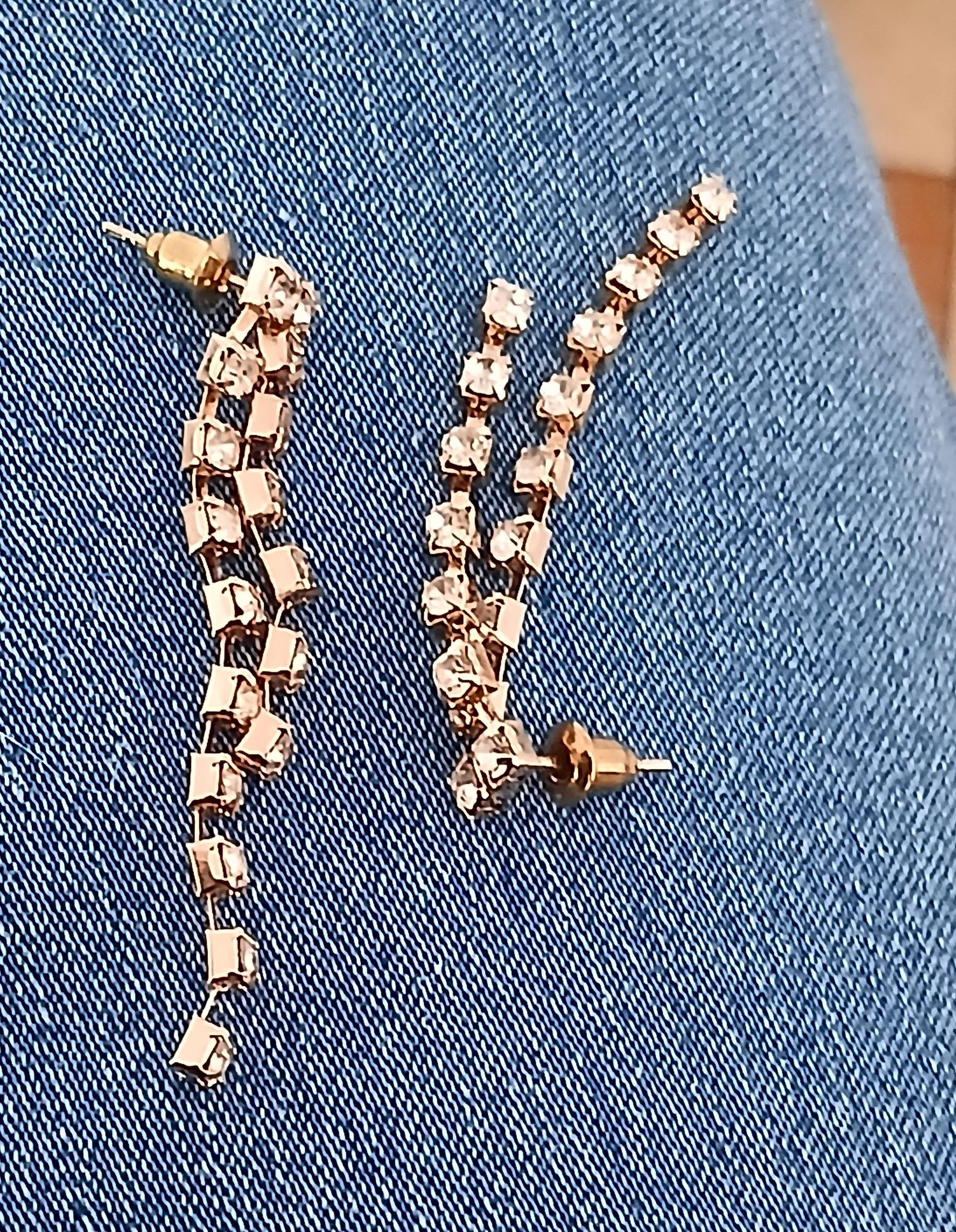 troc de troc une paire de boucle d oreille image 1