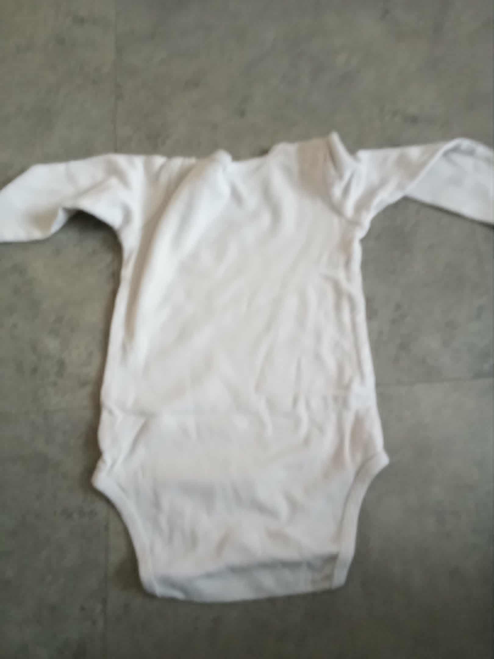 troc de troc body blanc petit dessin jaune 9 mois image 1