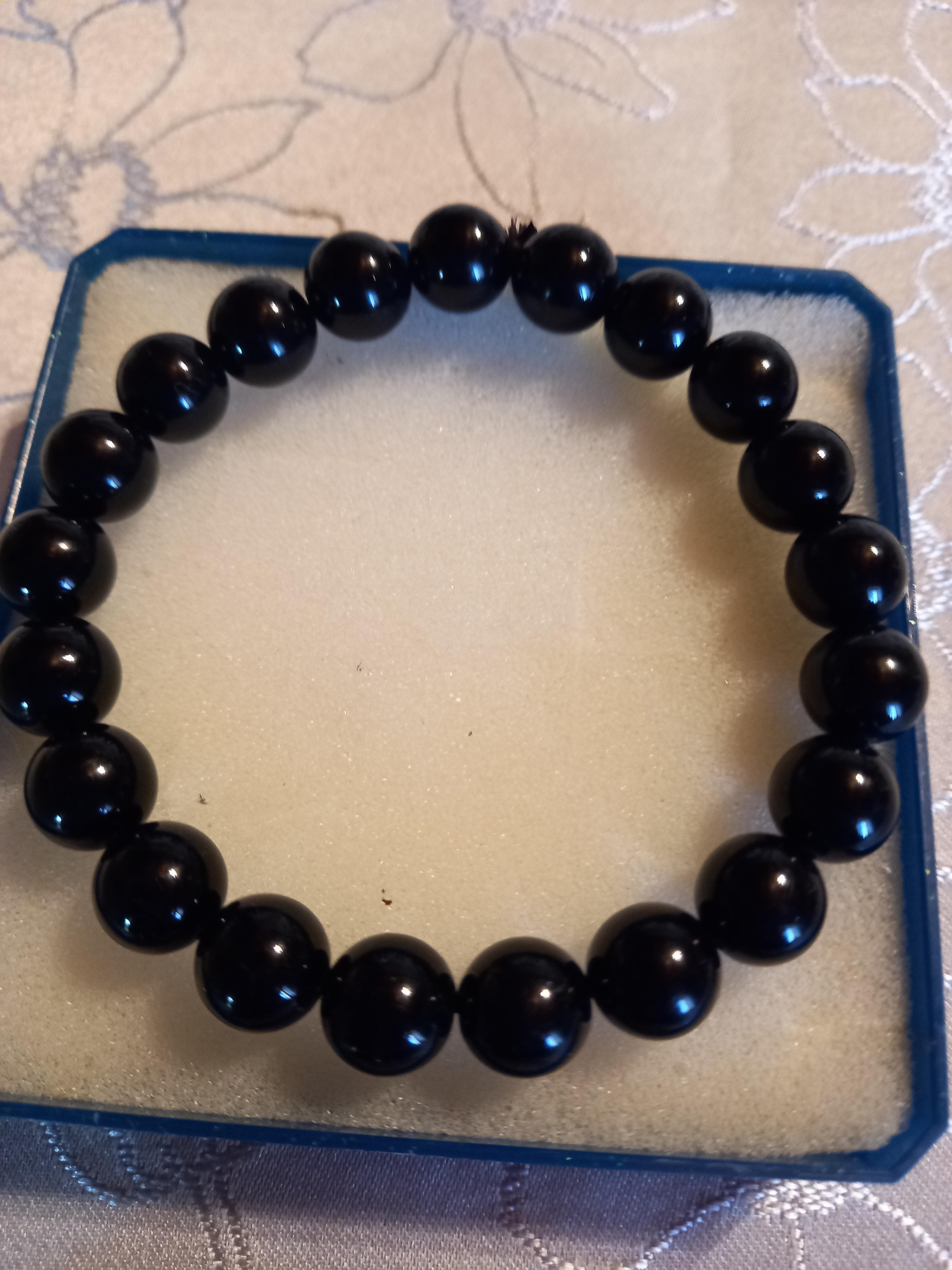 troc de troc bracelet à perles noires  reserve image 1
