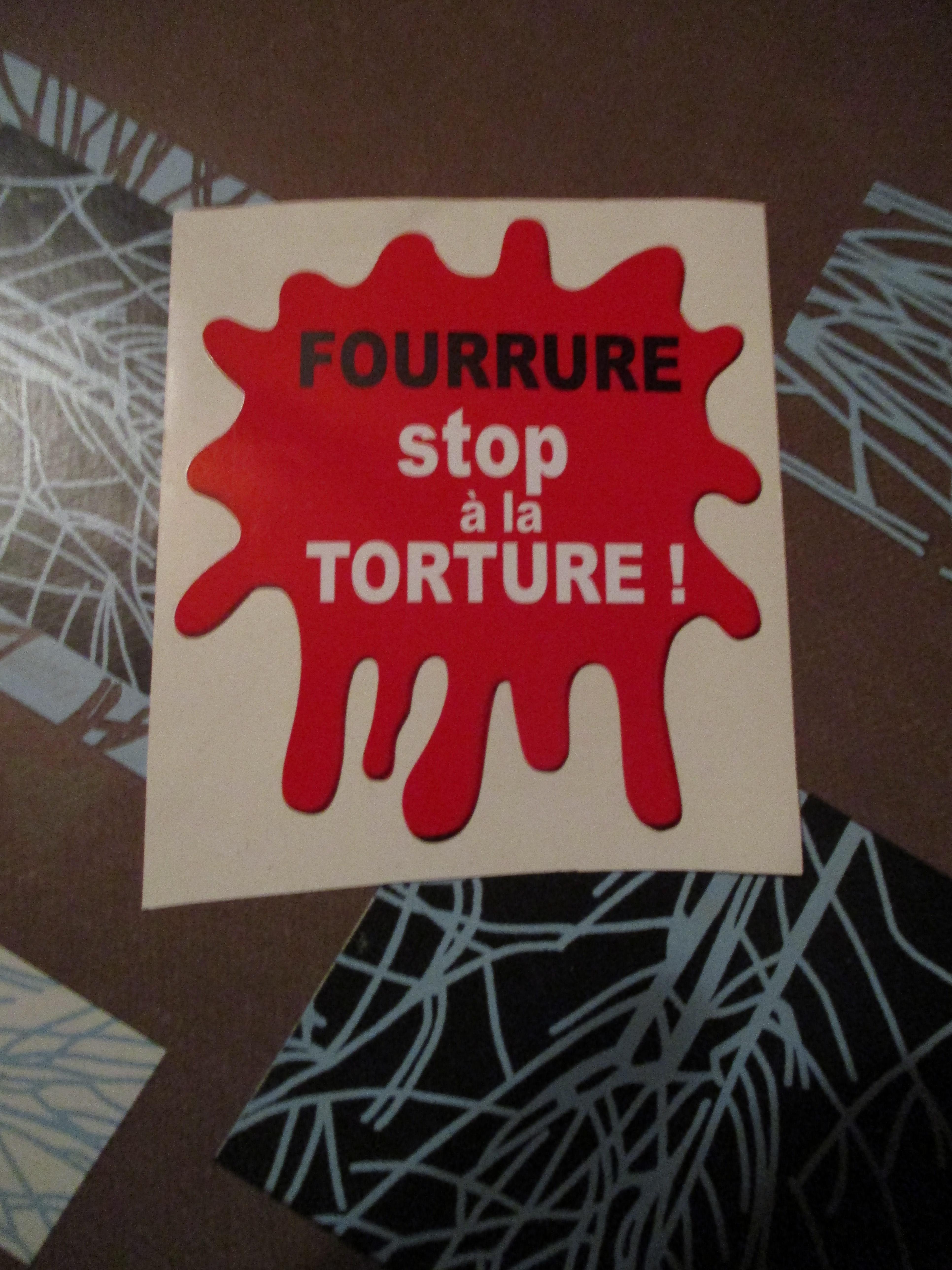 troc de troc autocollant fourrure stop image 0