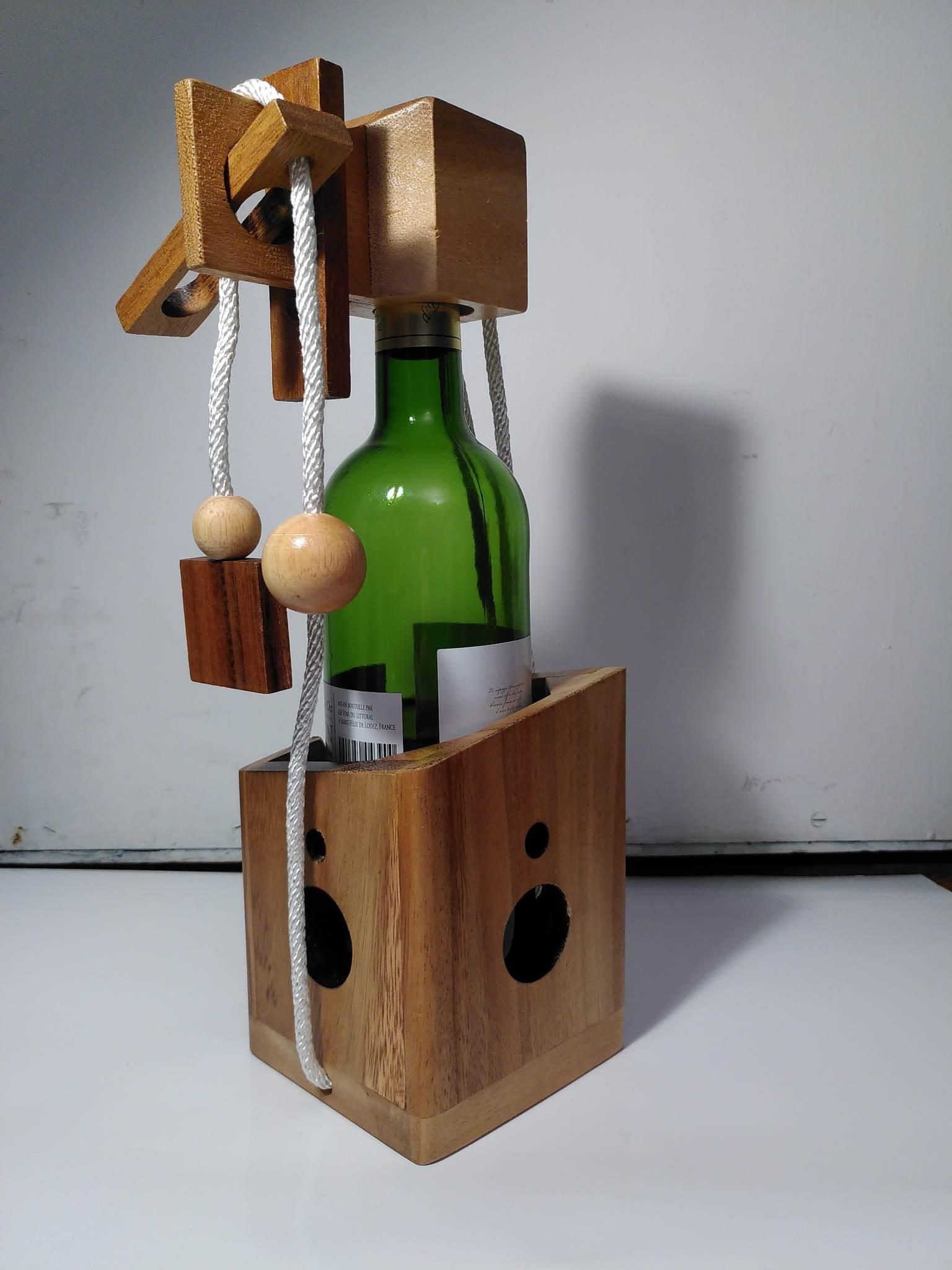 Troc casse-tête bouteille en bois