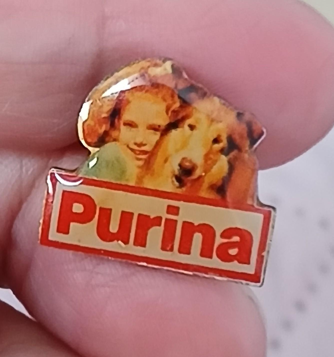 troc de troc reserver.  un pins ' purina ' image 0