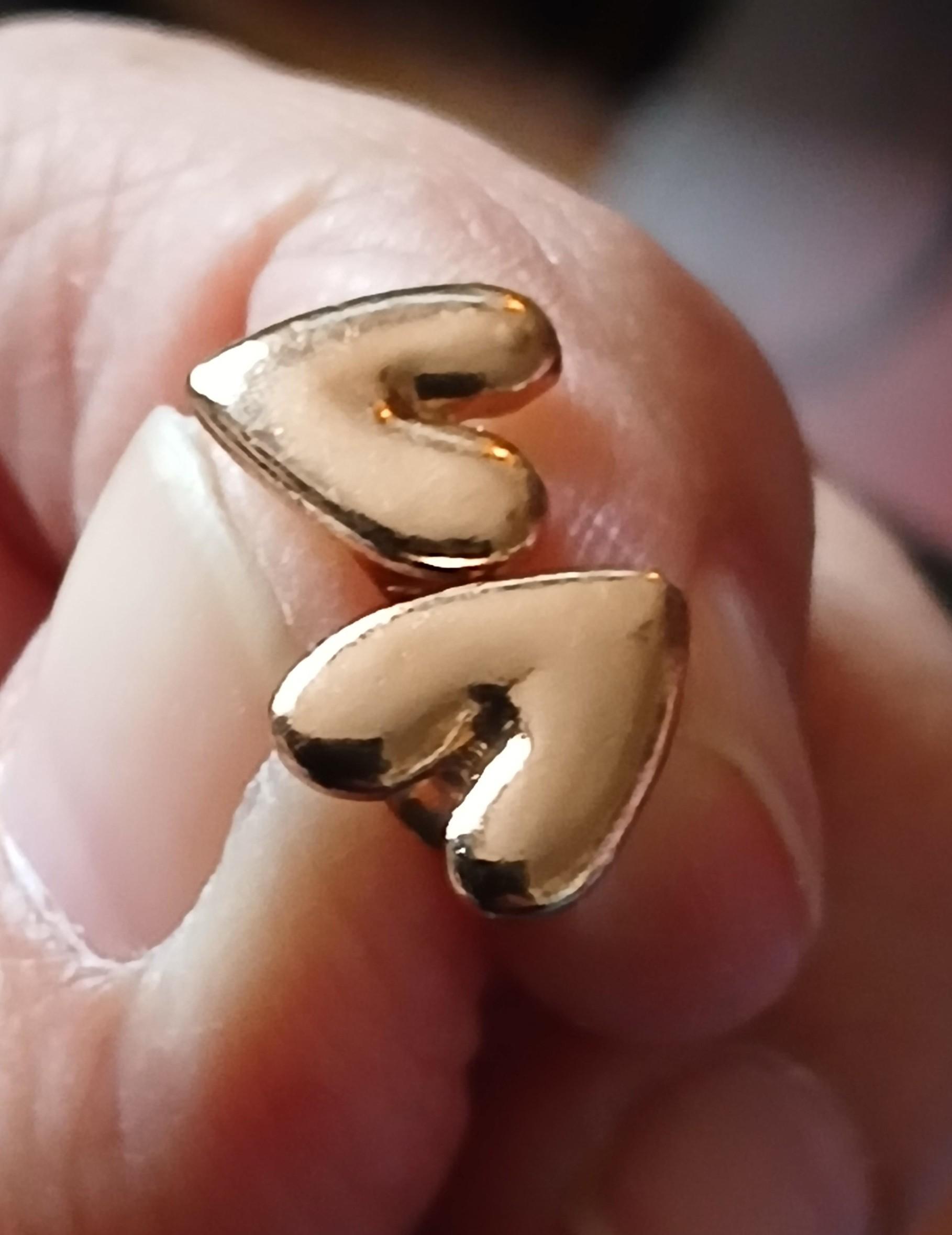 troc de troc une boucle d oreille image 1